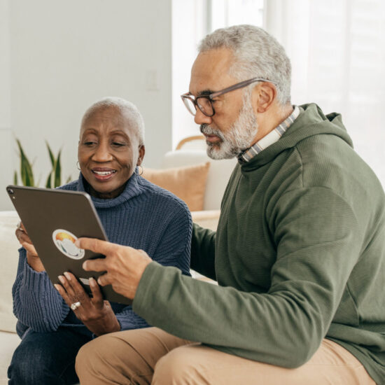 Senior couple using medical help online